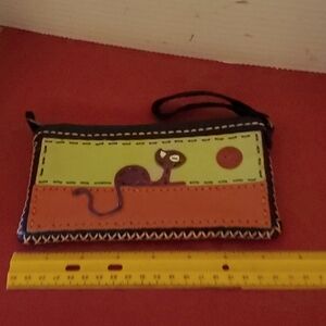 Brown leather zippered makeup/pouch with cat design orange green